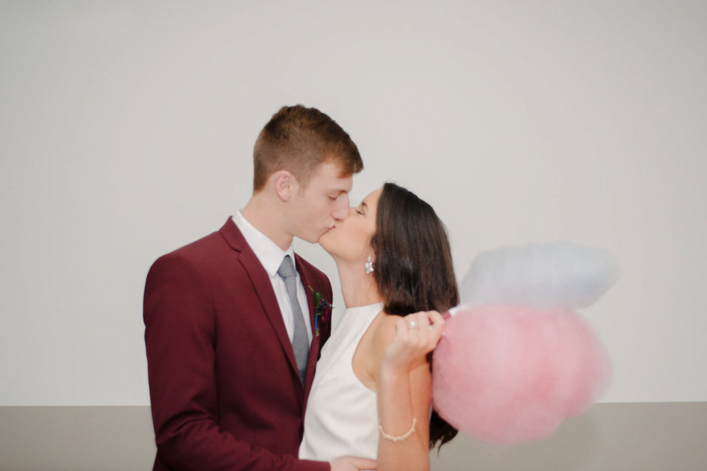couple kissing with art of sucre cotton candy