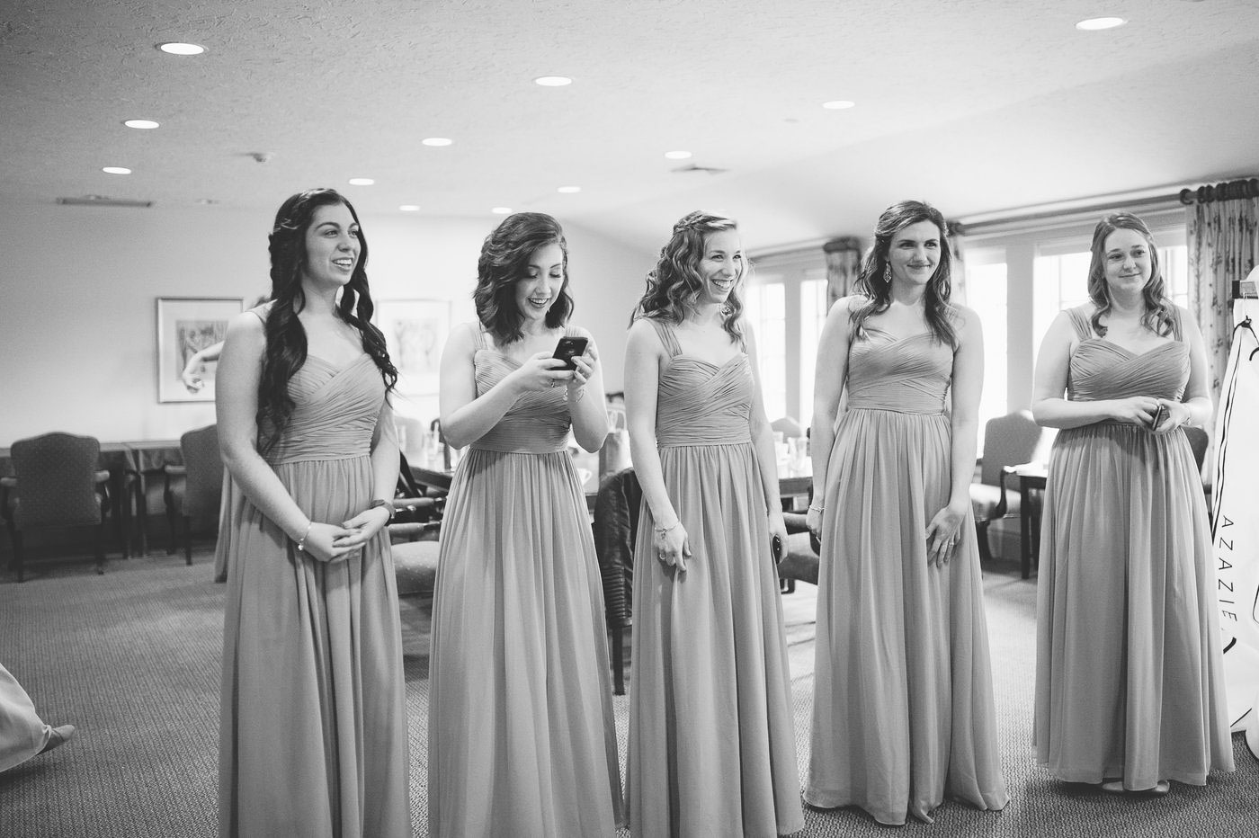 black and white bridesmaids first look with bride