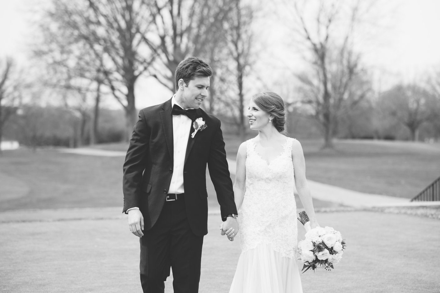 black and white bride and groom golf course portraits