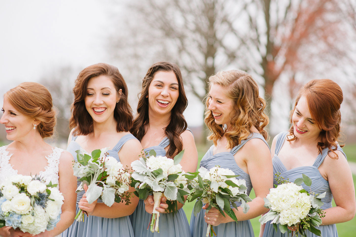 bridesmaids laughing on golf course