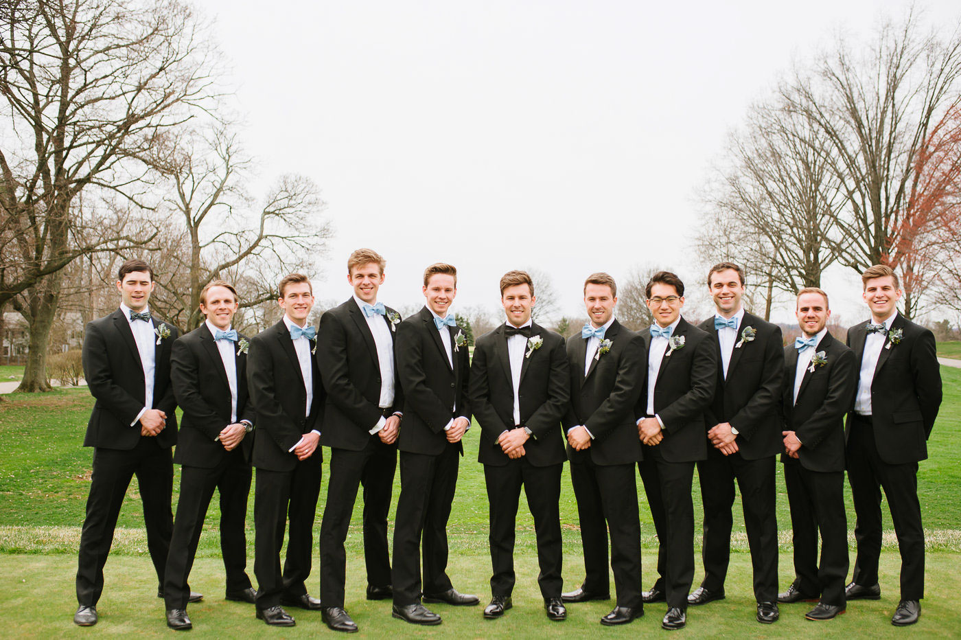 full groomsmen portraits on golf course