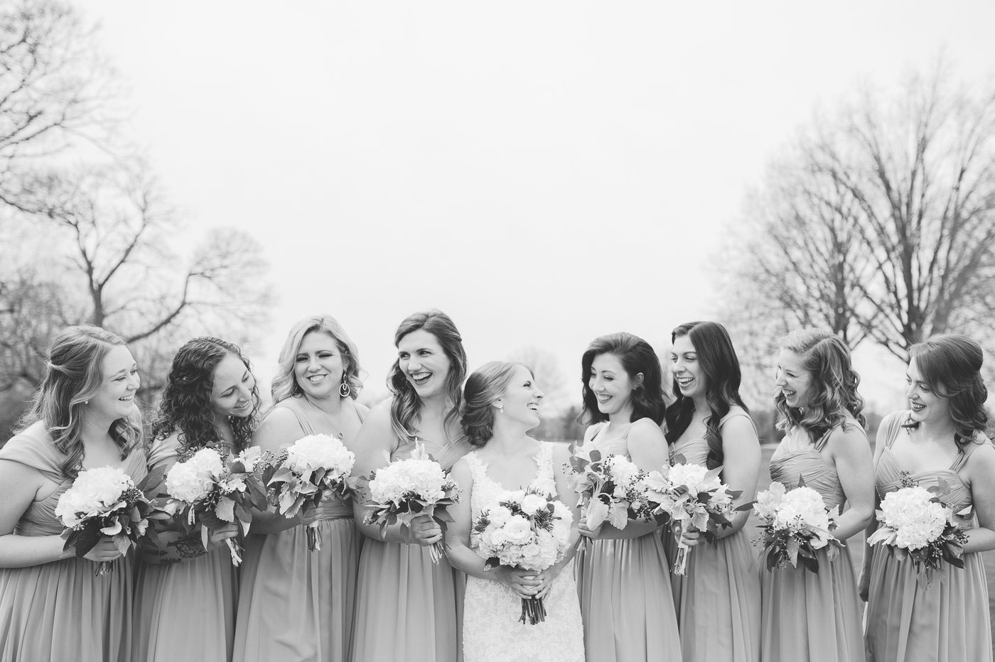 black and white full bridesmaids laughing portraits