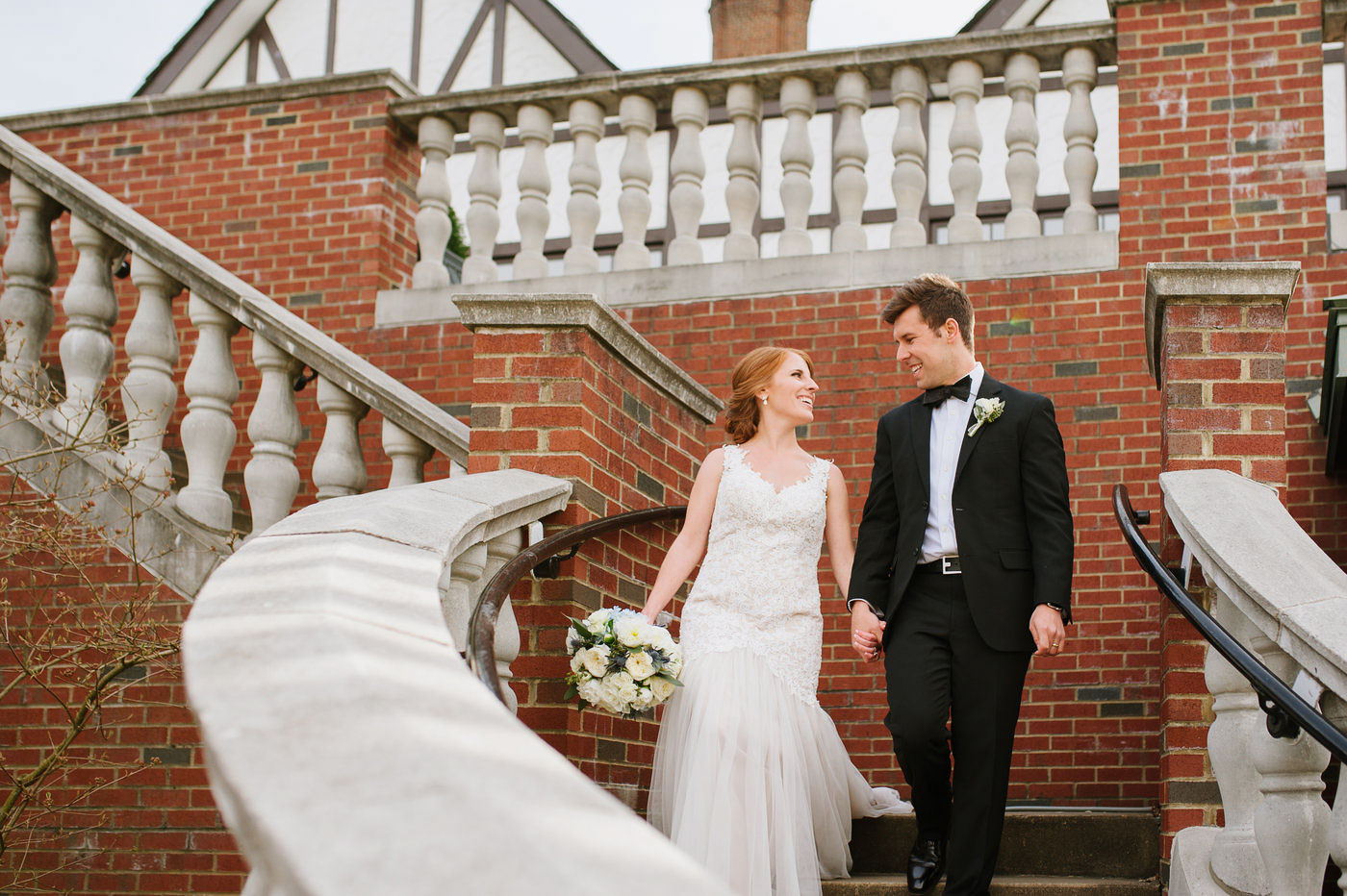 bride and groom portrait on staircase